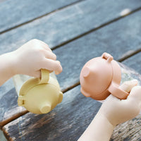 bonbo baby mug being held by baby
